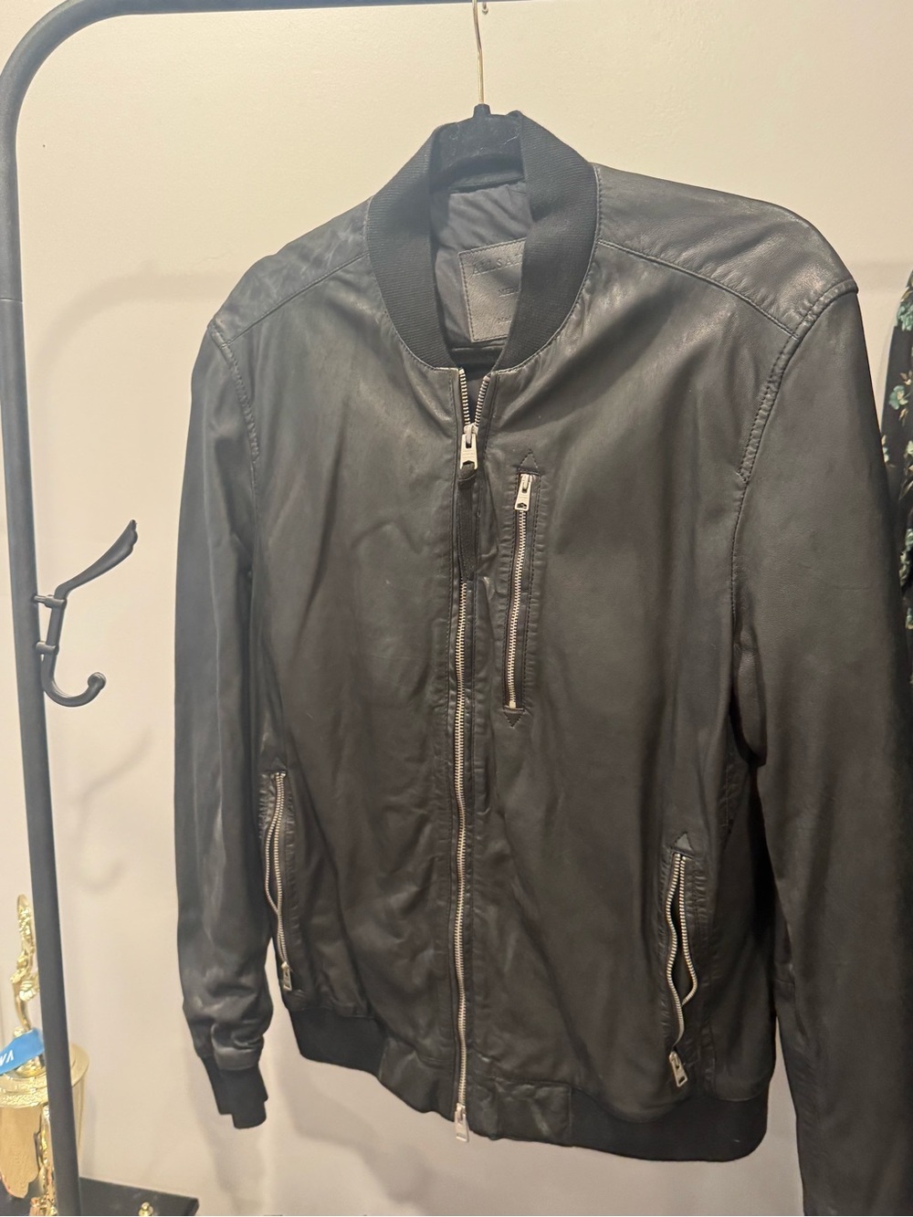 AllSaints Black Leather Bomber Jacket with Zip Pockets